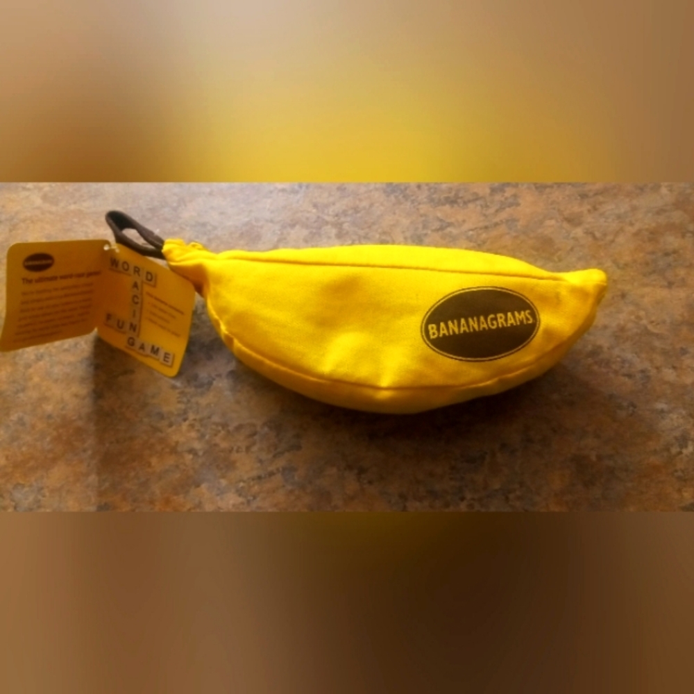 Banana Republic Bright Yellow Banana-Shaped Pouch word game